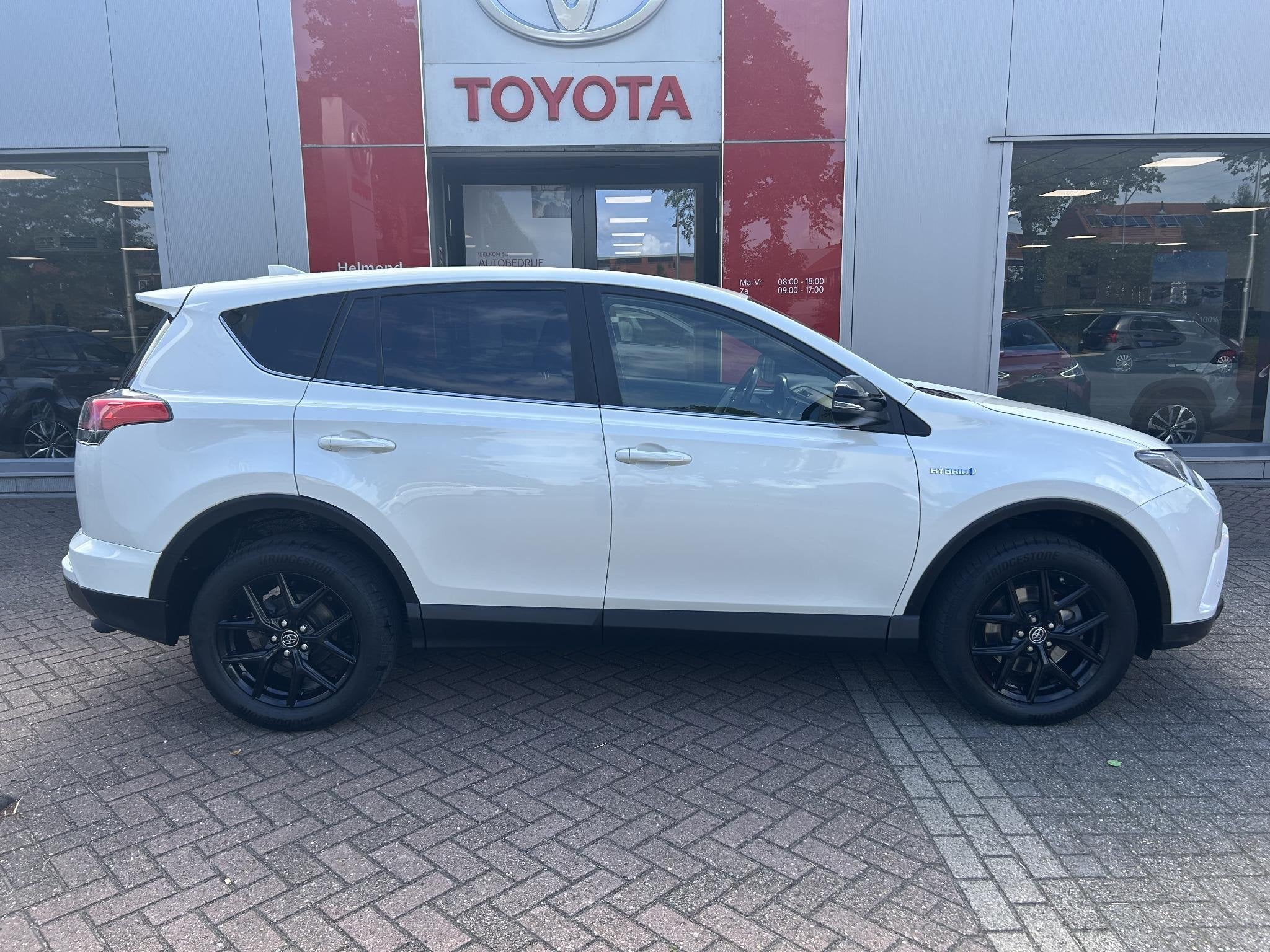 Toyota RAV4 2.5 Hybrid Black Edition Schuif-/kanteldak | AUT, Auto's, Toyota, Gebruikt, Euro 6, Wit, Hybride Elektrisch/Benzine