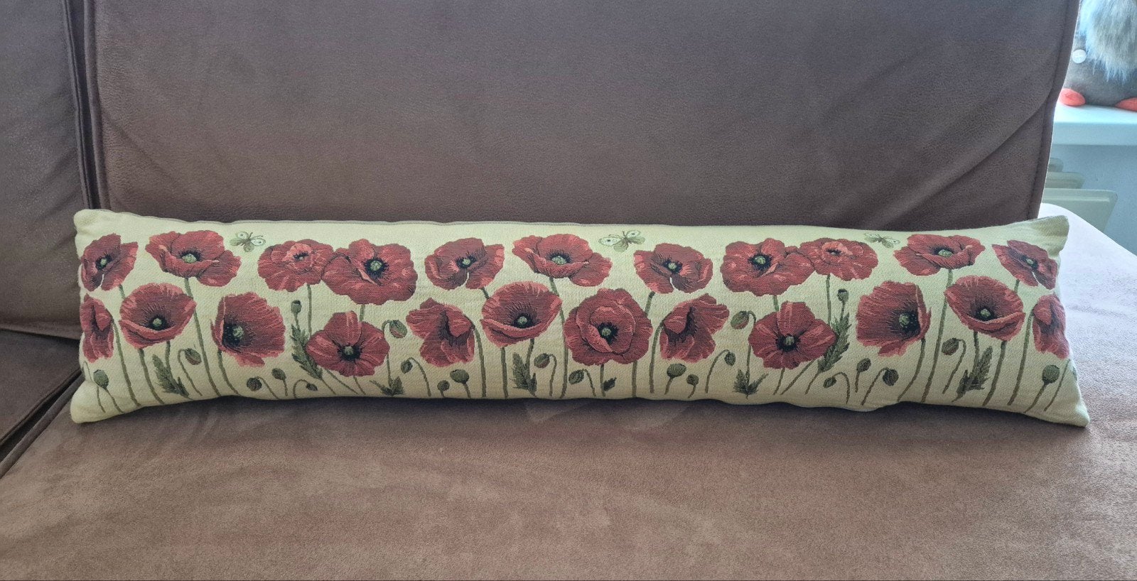 Langwerpig kussen met bloemen, Ophalen