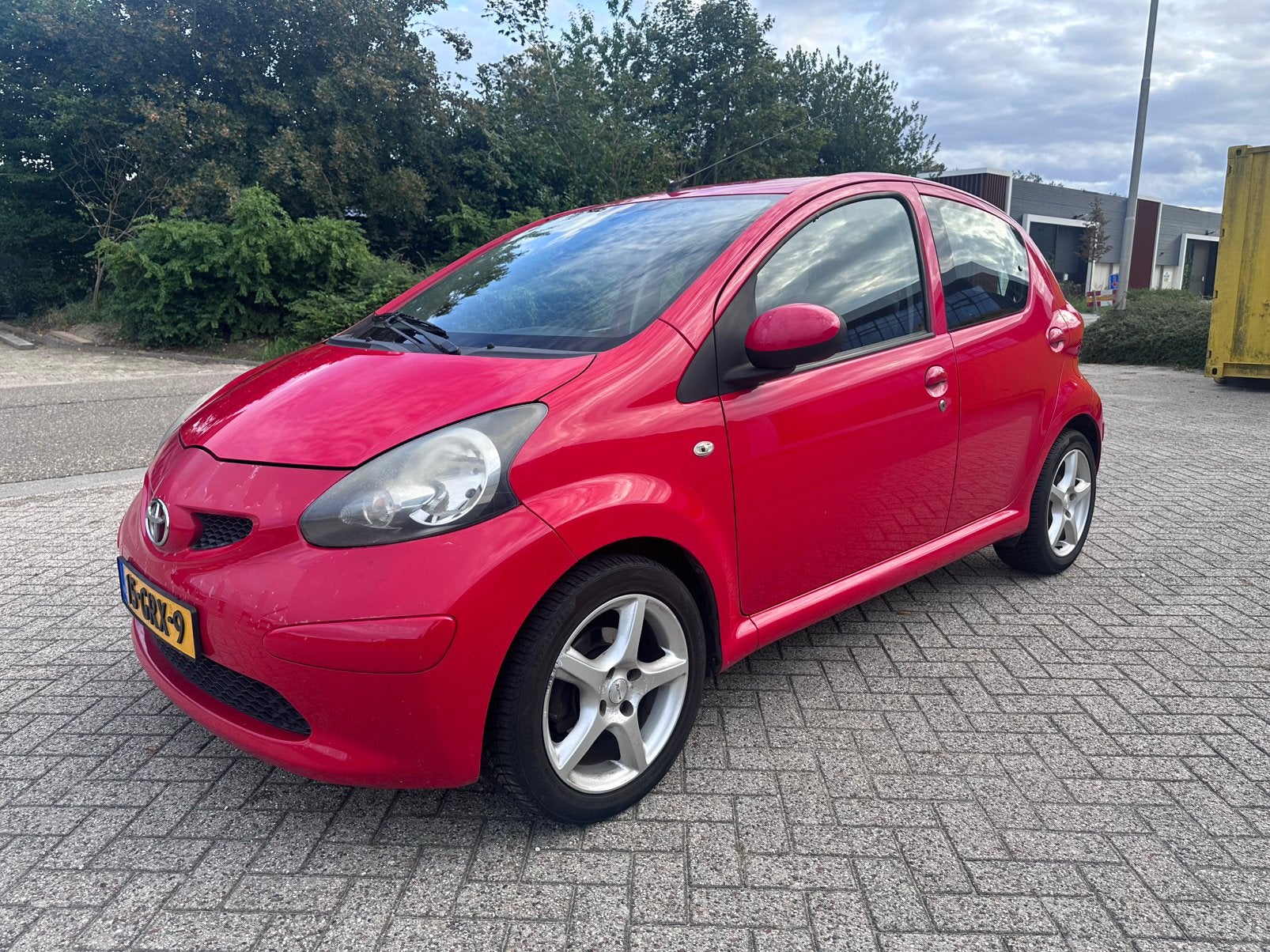Toyota Aygo 1.0 12V Vvt-i 5DRS 2007 Rood airco Elkt pakket, Auto's, Voorwielaandrijving, 4 stoelen, 68 pk, Handgeschakeld