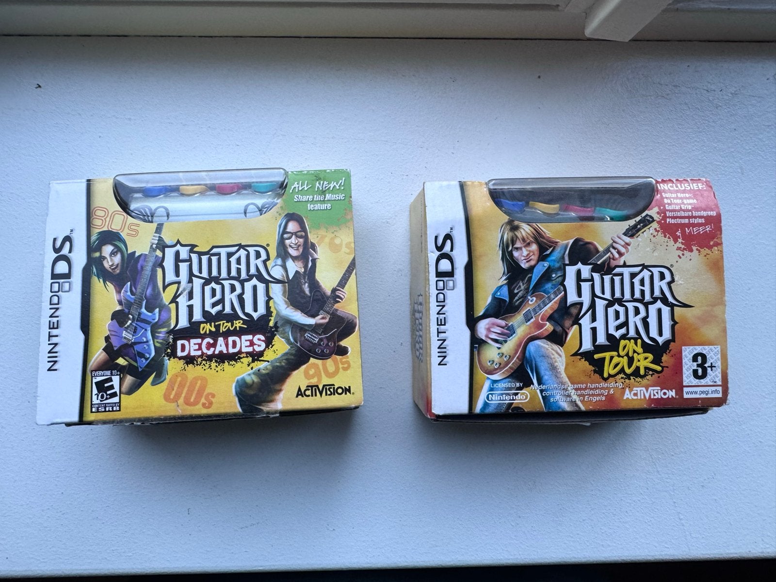 Guitar Hero On Tour & Decades voor Nintendo DS met grip, Muziek, Gebruikt, 1 speler, Ophalen of Verzenden