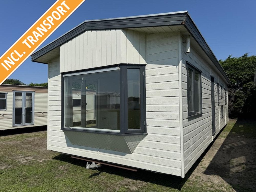 Spiegelbeeld winterhard chalet met 3 slaapkamers en CV, Caravans en Kamperen