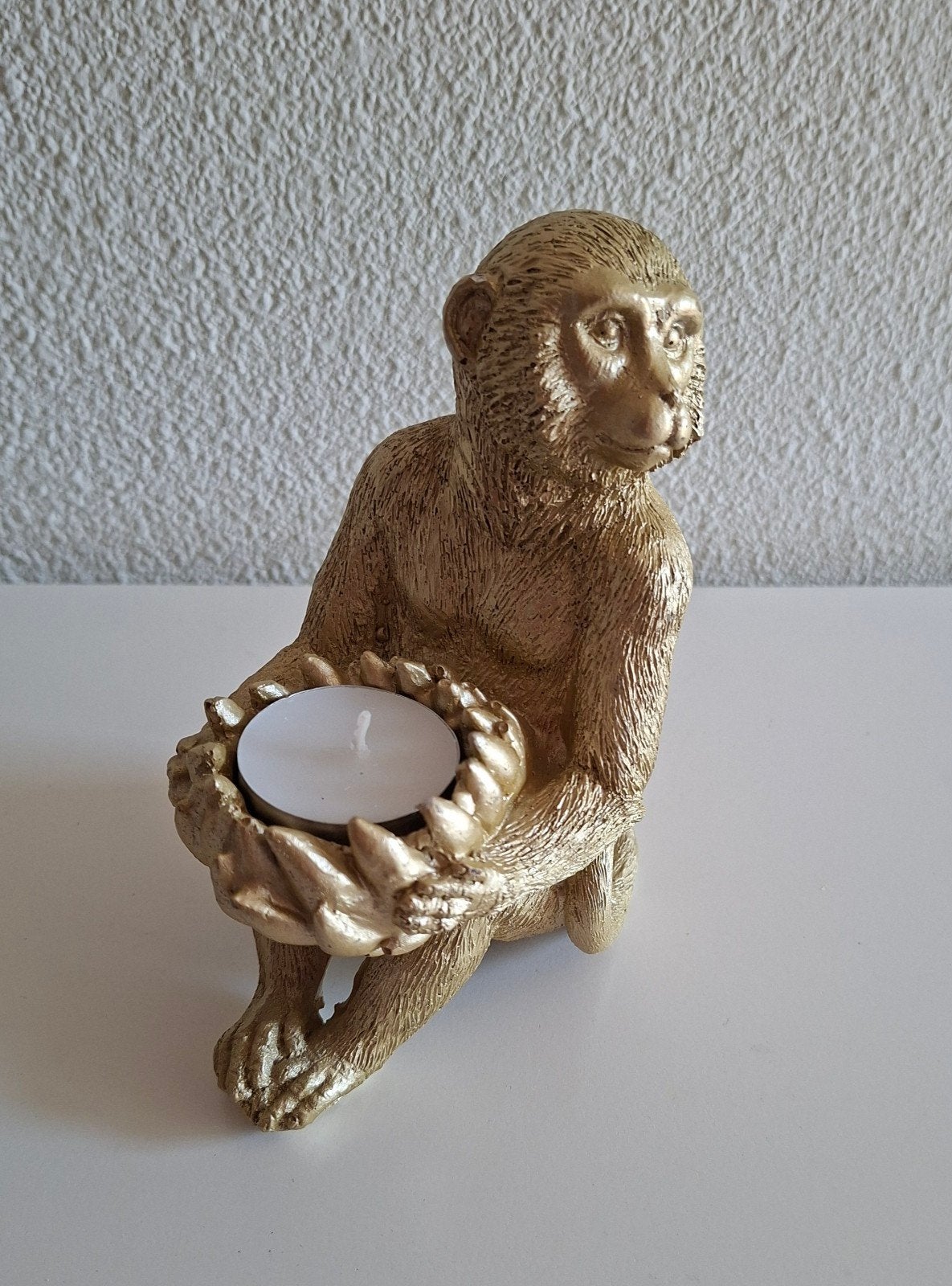 Waxinelichthouder/Sfeerlichtje "Aap". Goudkleurig., Ophalen of Verzenden, Gebruikt, Goud, Steen/keramiek
