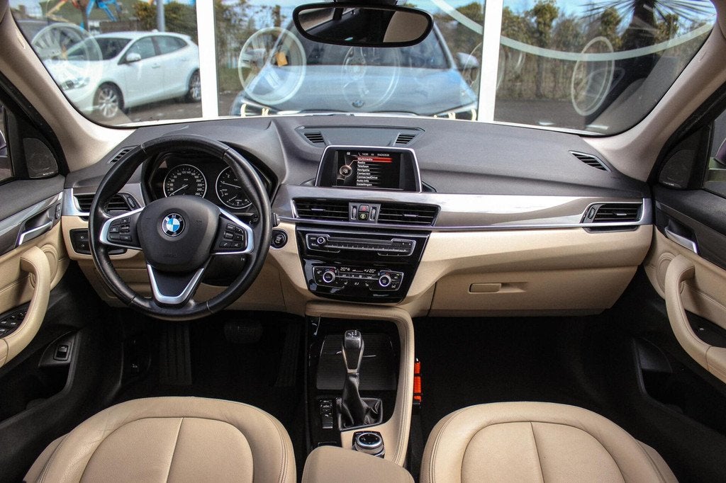 BMW X1 sDrive18i Centennial High Executive X-line | 2e eigen, Auto's, BMW, 136 pk, Gebruikt, Wit, Leder