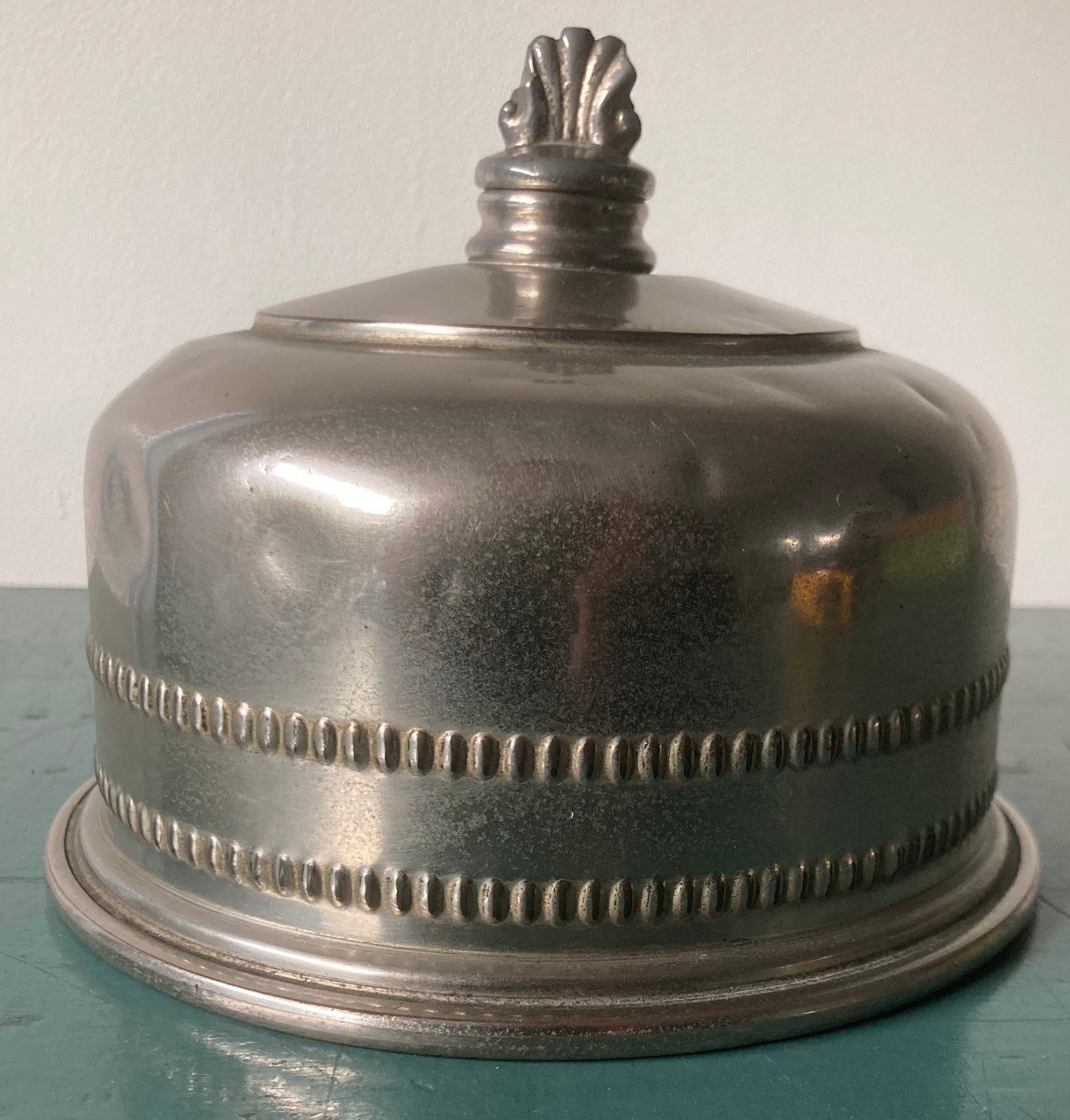 Boterwarmer, Ophalen