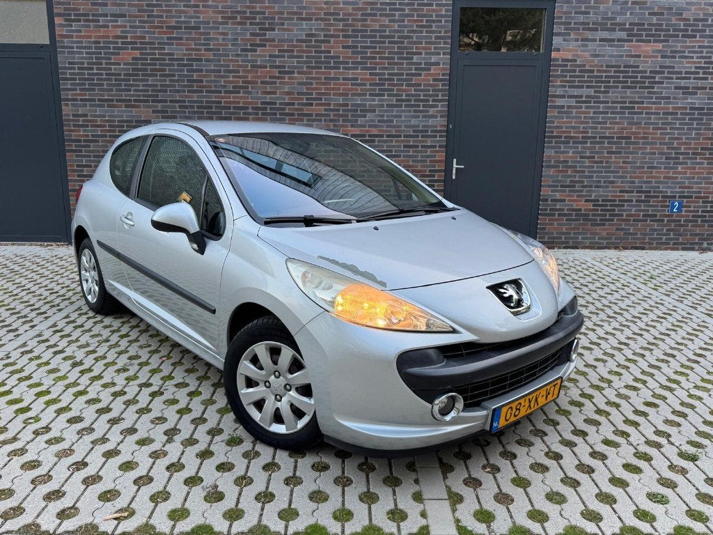 Peugeot 207 1.4 16V 3DRS 2007 Grijs, Auto's, Voorwielaandrijving, Dealer onderhouden, Stof, Zwart