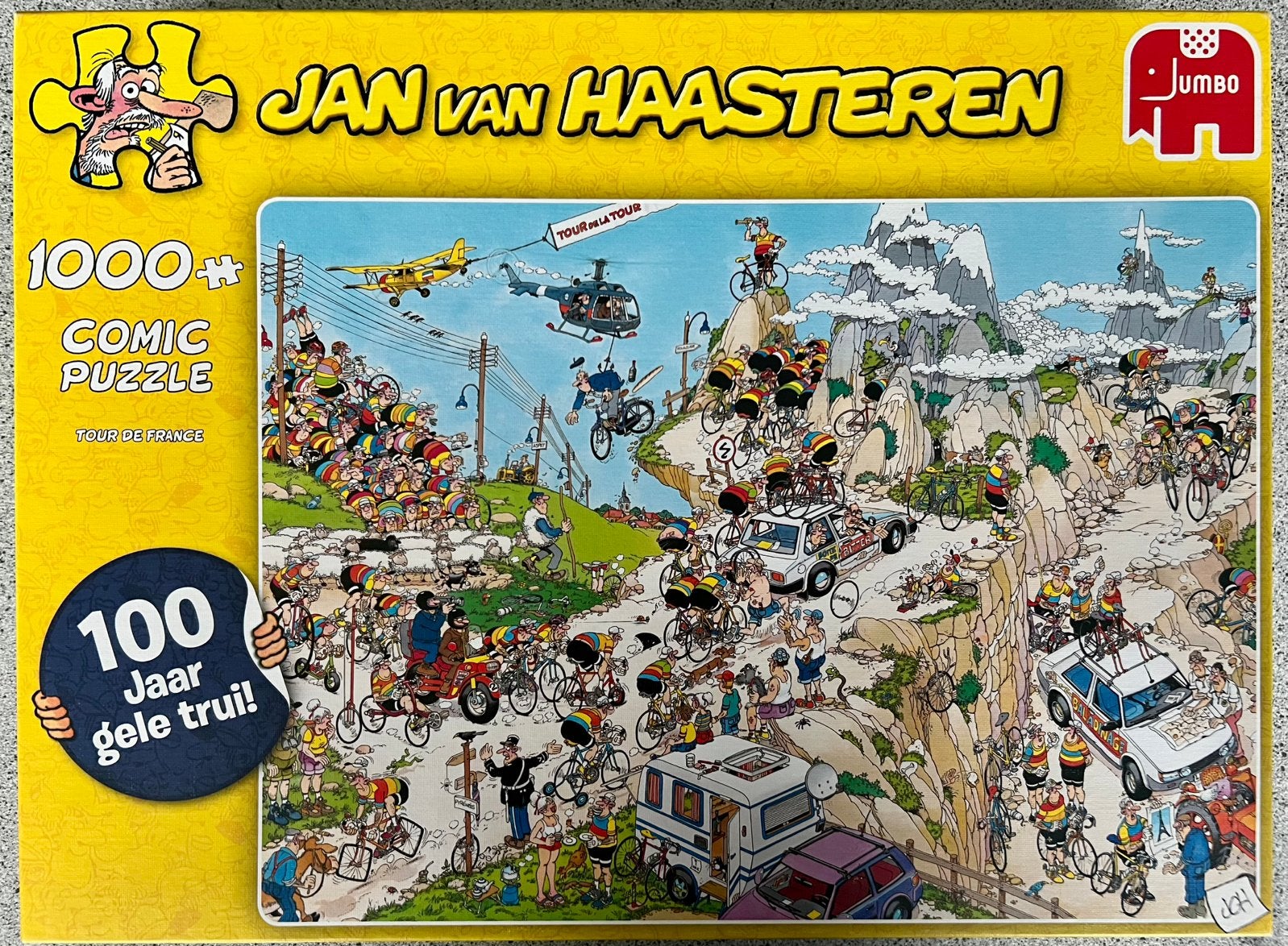 Jan van Haasteren “Tour de France” gele doos 1000 stukjes, Ophalen of Verzenden, 500 t/m 1500 stukjes, Zo goed als nieuw