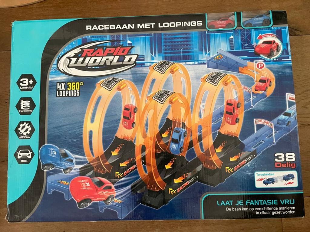 Mechanische racebaan met loopings, Kinderen en Baby's, Speelgoed | Racebanen, Ophalen, Zo goed als nieuw, Elektrisch, Overige merken