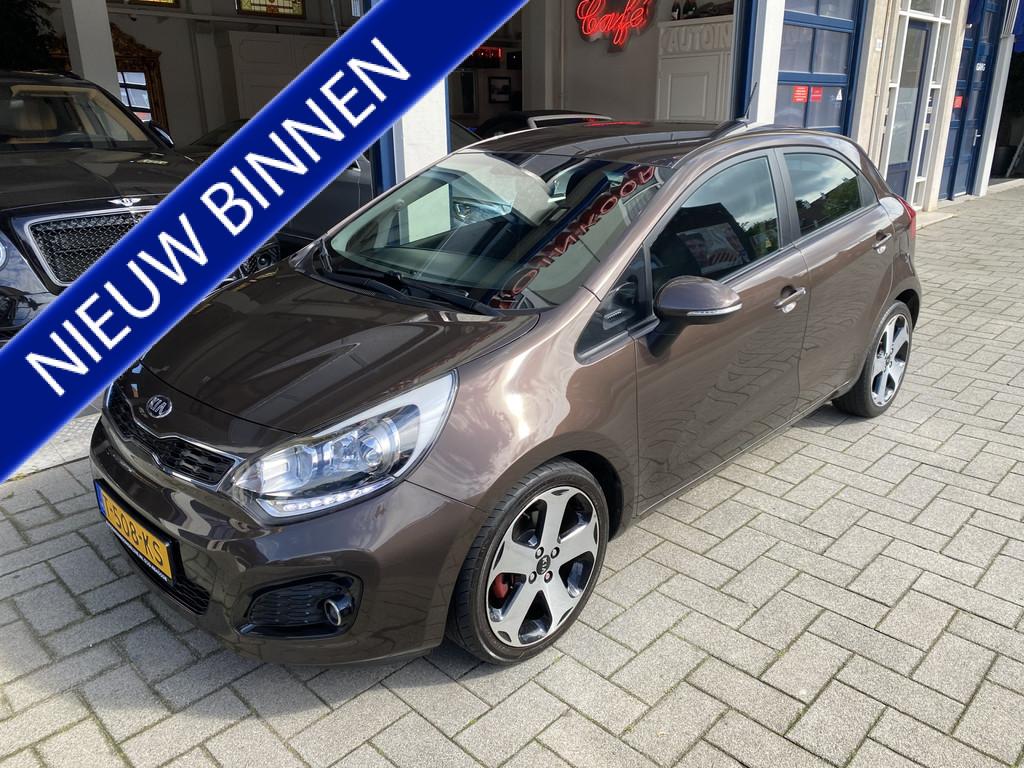 Kia Rio 1.4 CVVT Plus Pack AUTOMAAT/NAV/CLIMA/CAMERA/CRUISE, Auto's, Euro 5, 450 kg, Gebruikt, 4 cilinders