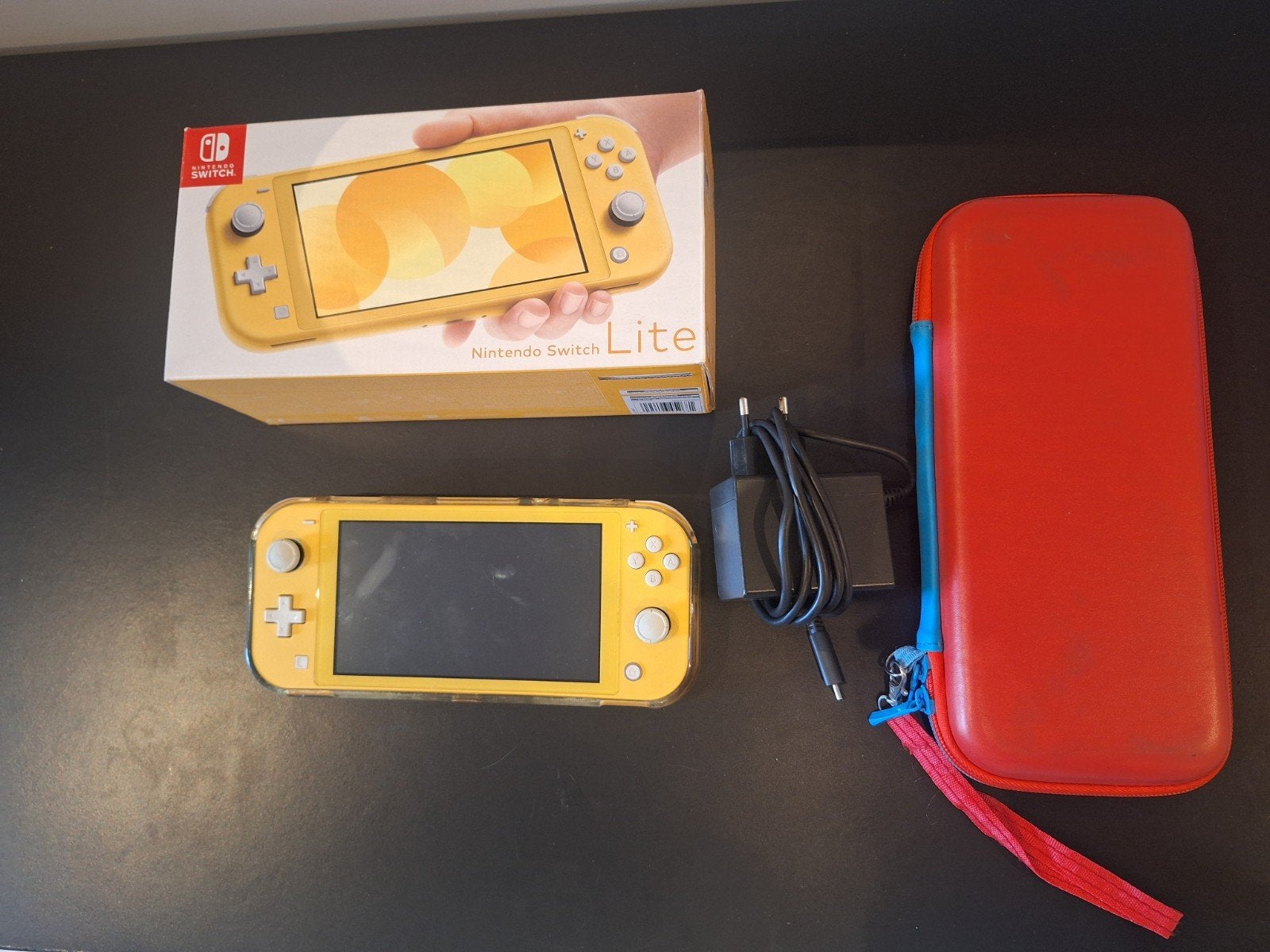 Nintendo Switch Lite, Spelcomputers en Games, Spelcomputers | Nintendo Switch Lite, Ophalen of Verzenden, Geel, Zo goed als nieuw