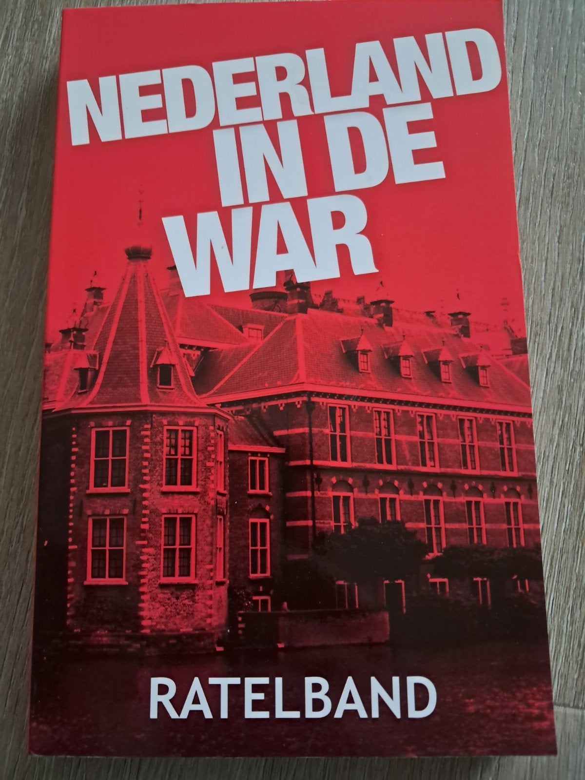 K6 Nederland in de War - Ratelband, Ophalen of Verzenden, 20e eeuw of later, Gelezen, Ratelband