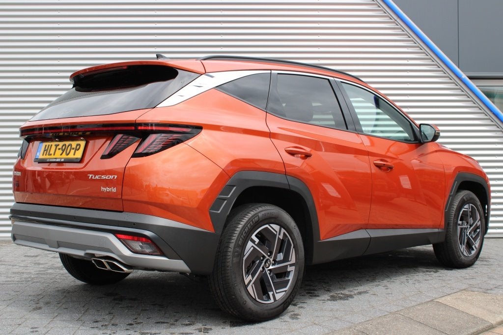 Hyundai Tucson 1.6 T-GDI HEV Comfort | Navi | Camera | Stoel, Auto's, Dealer onderhouden, Stof, Gebruikt, 1360 kg