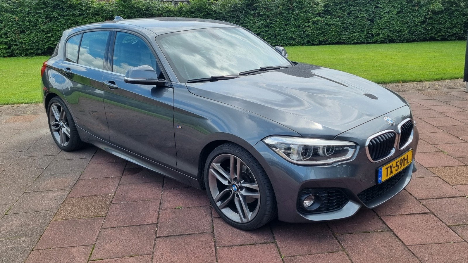 BMW 1-Serie 118i 136pk Aut 2018 Grijs, Auto's, 1295 kg, Origineel Nederlands, 650 kg, Particulier
