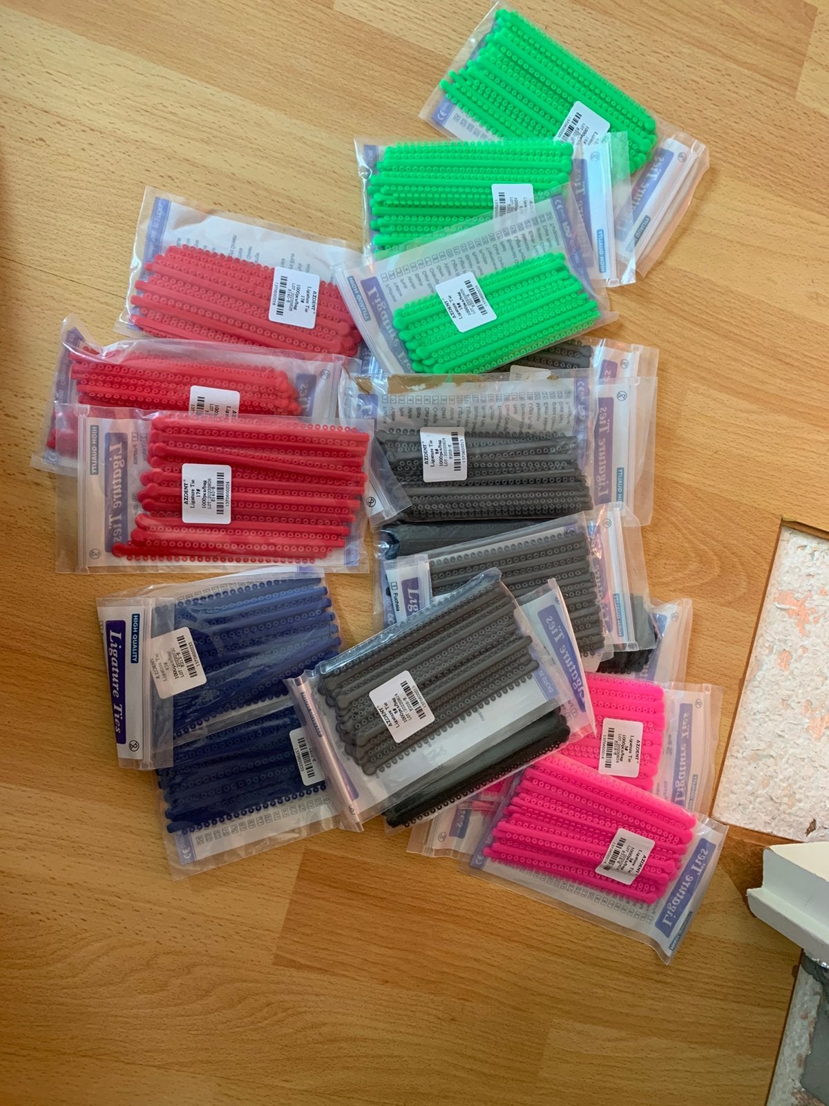 Nieuwe Azdent beugel elastiekjes diverse kleuren per 1000, Ophalen of Verzenden, Nieuw, Overige typen