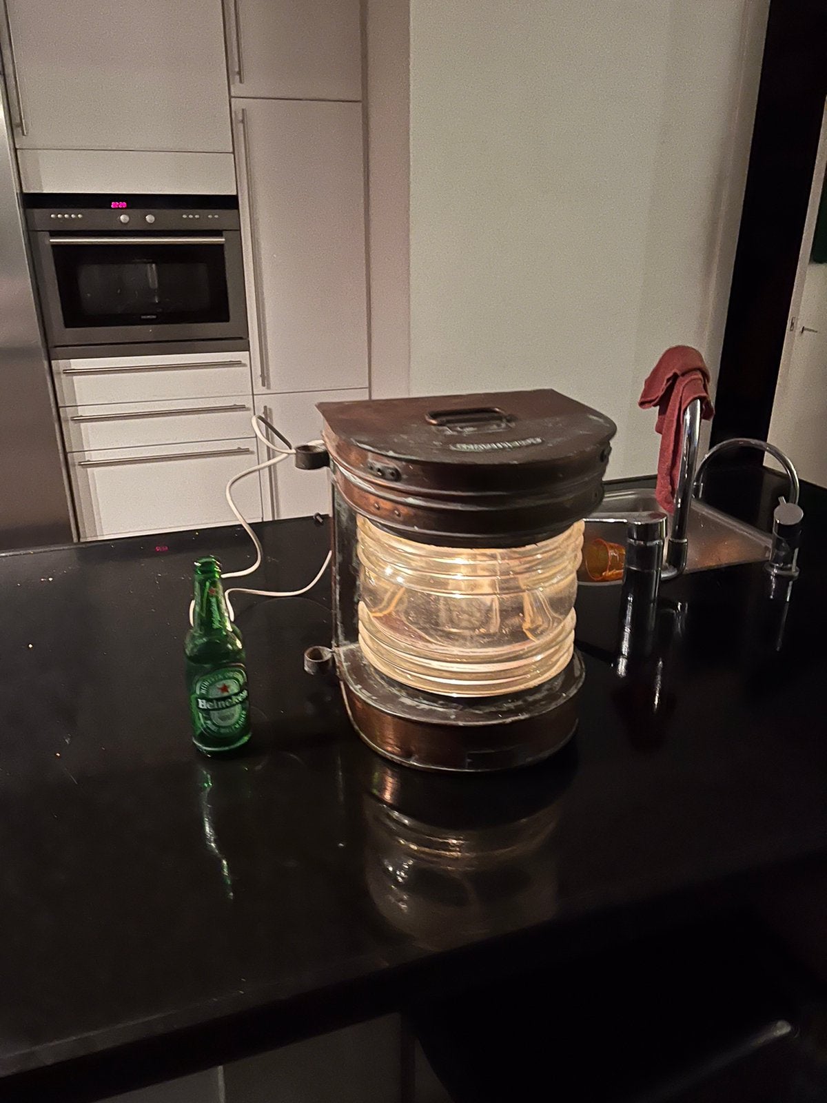 Koperen scheepslamp, Ophalen
