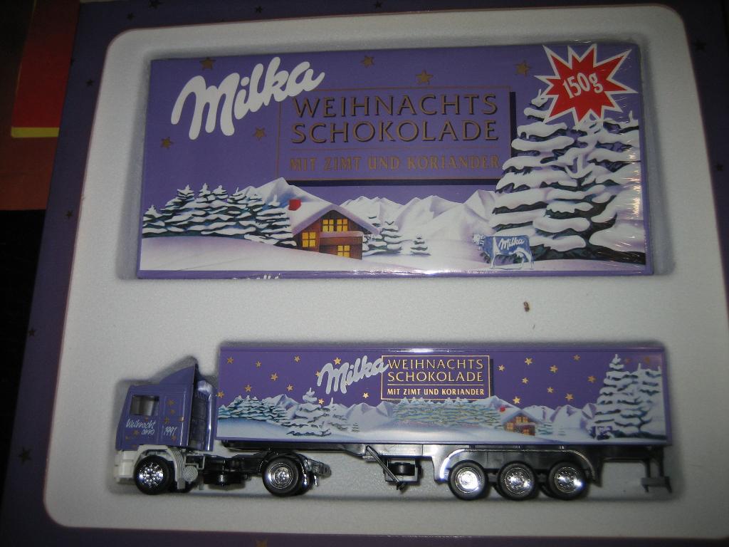 Milka Weihnachten 1991 VOLVO in box met chocolade Albedo, Hobby en Vrije tijd, Modelauto's | 1:87, Ophalen of Verzenden, Nieuw