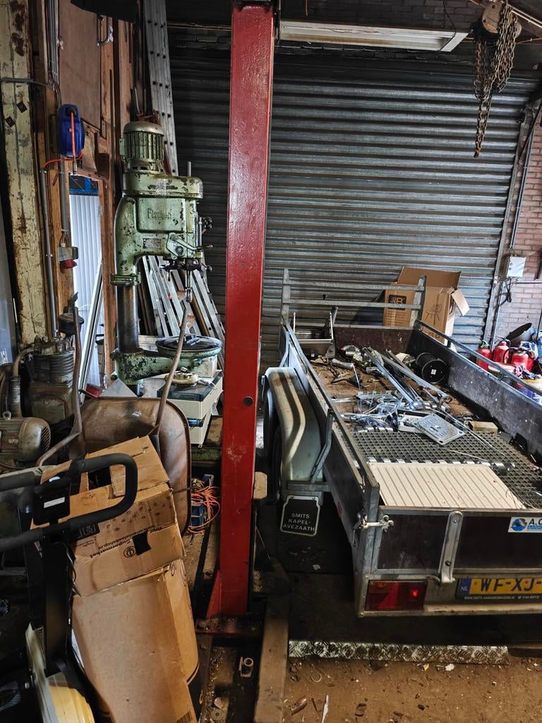 2-koloms hefbrug voor garage of werkplaats, Ophalen