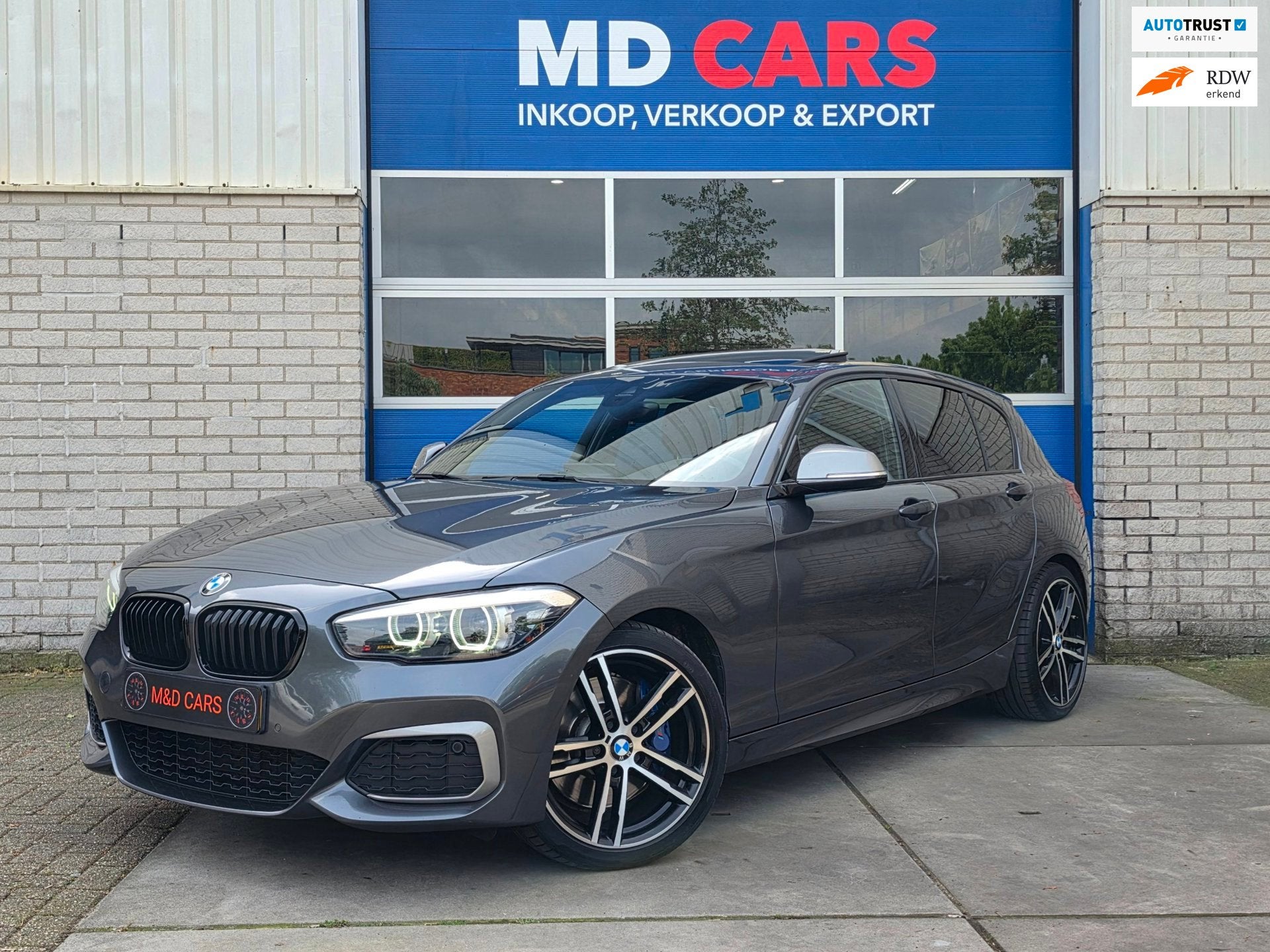 BMW 1-serie M140i xDrive High Executive SCHUIFDAK/MEMORY STO, Auto's, Gebruikt, Alcantara, 340 pk, 14 km/l