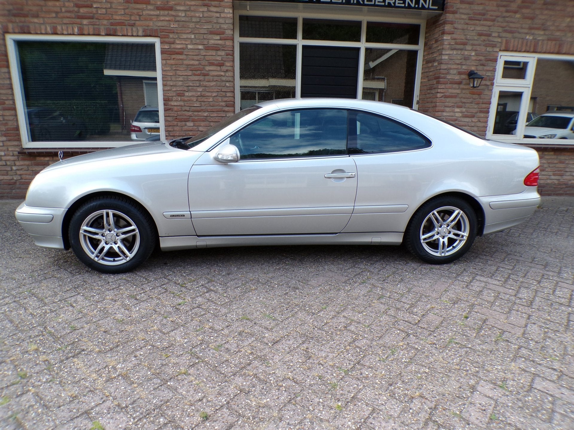 Mercedes-Benz CLK-klasse Coupé 200 K. Avantgarde, Auto's, Gebruikt, Zwart, 4 cilinders, 4 stoelen