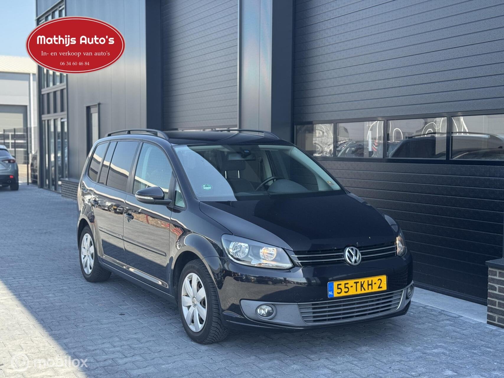 Volkswagen Touran 1.6 TDI Highline BlueMotion, Auto's, Voorwielaandrijving, Euro 5, 4 cilinders, Zwart