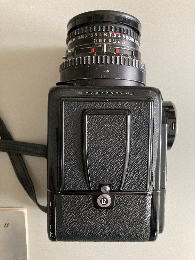 Hasselblad 500c/m camera met Carl Zeiss lens, Audio, Tv en Foto, Fotocamera's Analoog, Ophalen, Gebruikt, Spiegelreflex, Canon