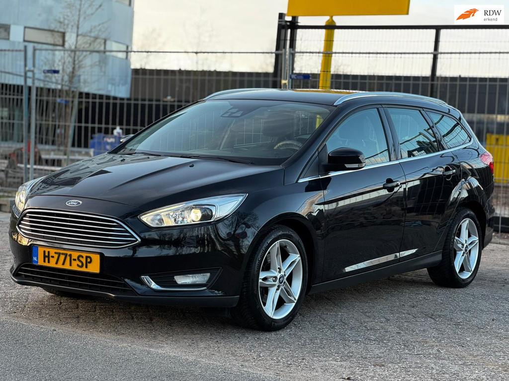 Ford Focus Wagon 1.5 EcoBoost Titanium|xenon|camera|navi|hal, Auto's, Ford, Euro 6, 4 cilinders, Leder en Stof, Zwart