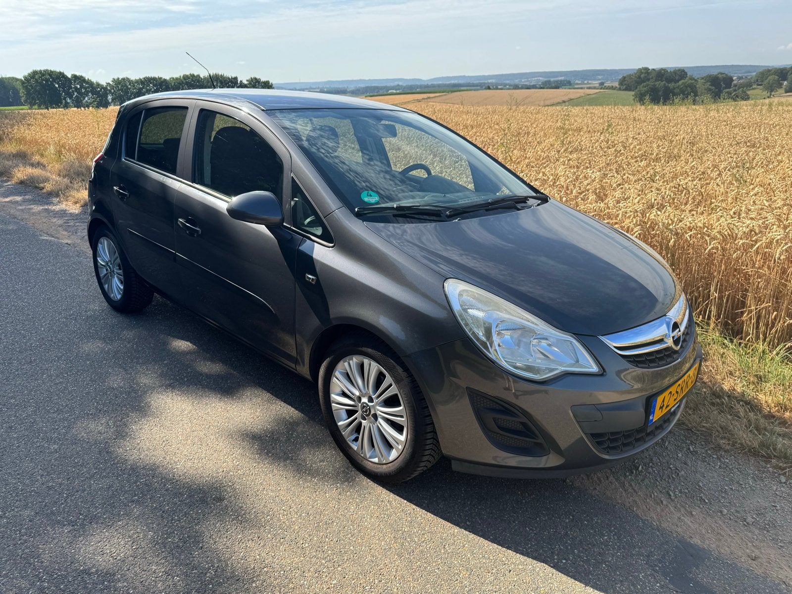 Opel Corsa 1.4 16V 5D 2012 Grijs, Auto's, Voorwielaandrijving, 1063 kg, 1398 cc, 4 cilinders