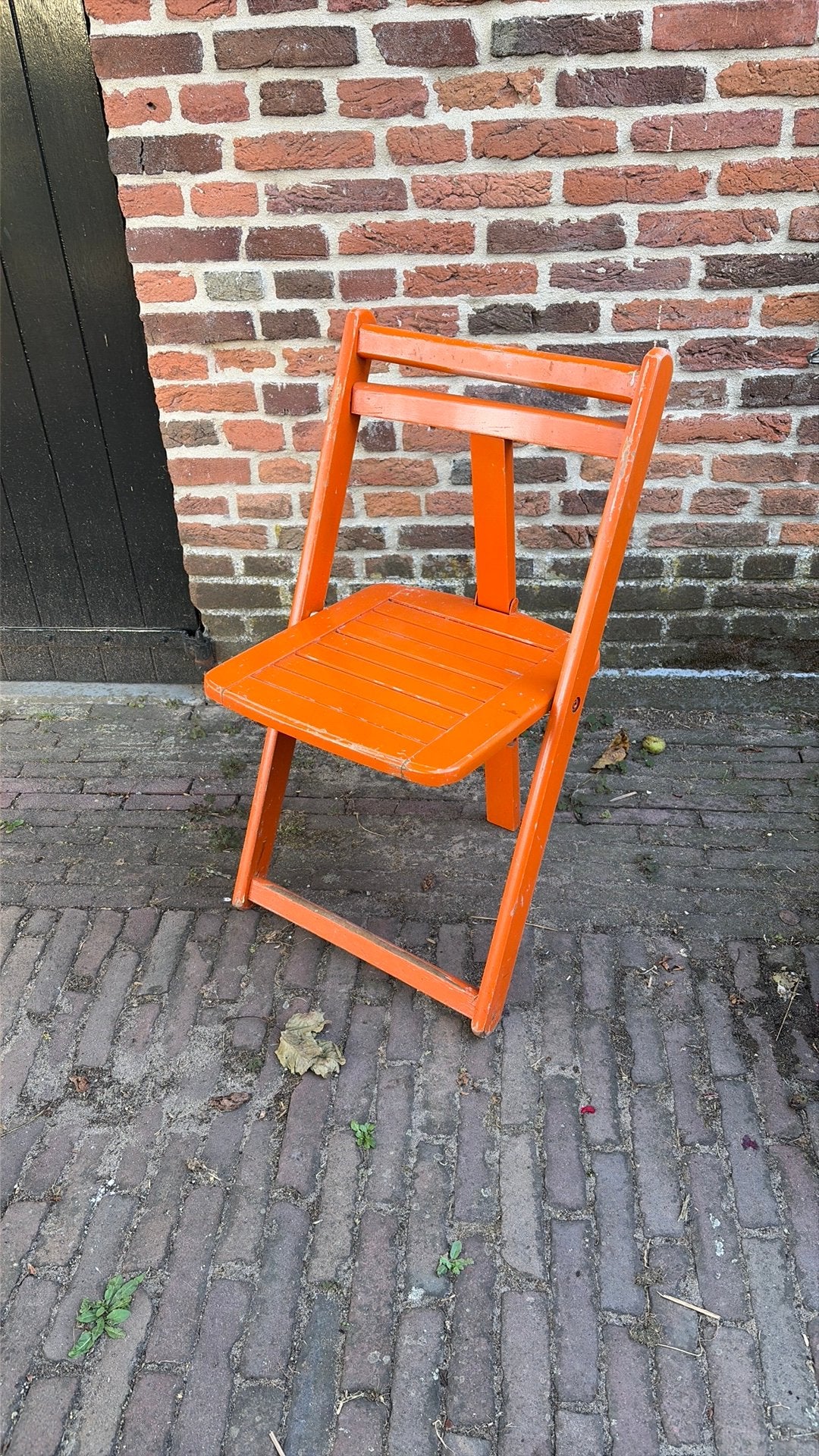 Vintage oranje houten klapstoel driepoot, Ophalen, Zo goed als nieuw, Overige kleuren, Eén