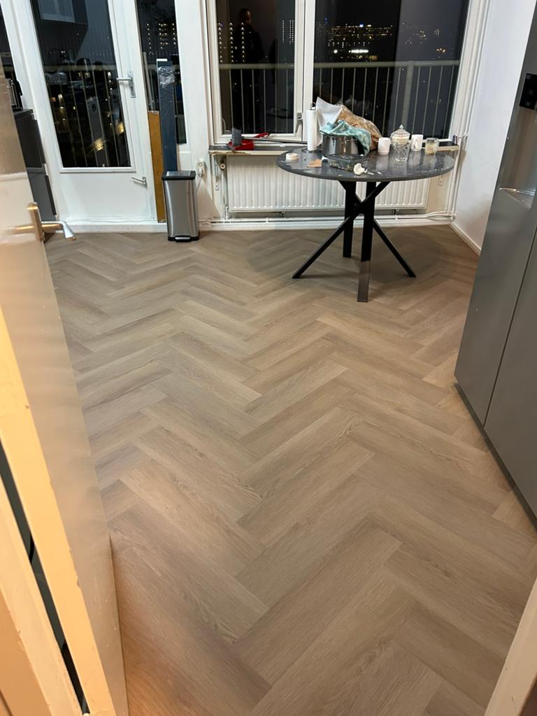 Laminaat legger nodig, Ophalen of Verzenden, Zo goed als nieuw, 75 m² of meer, Laminaat