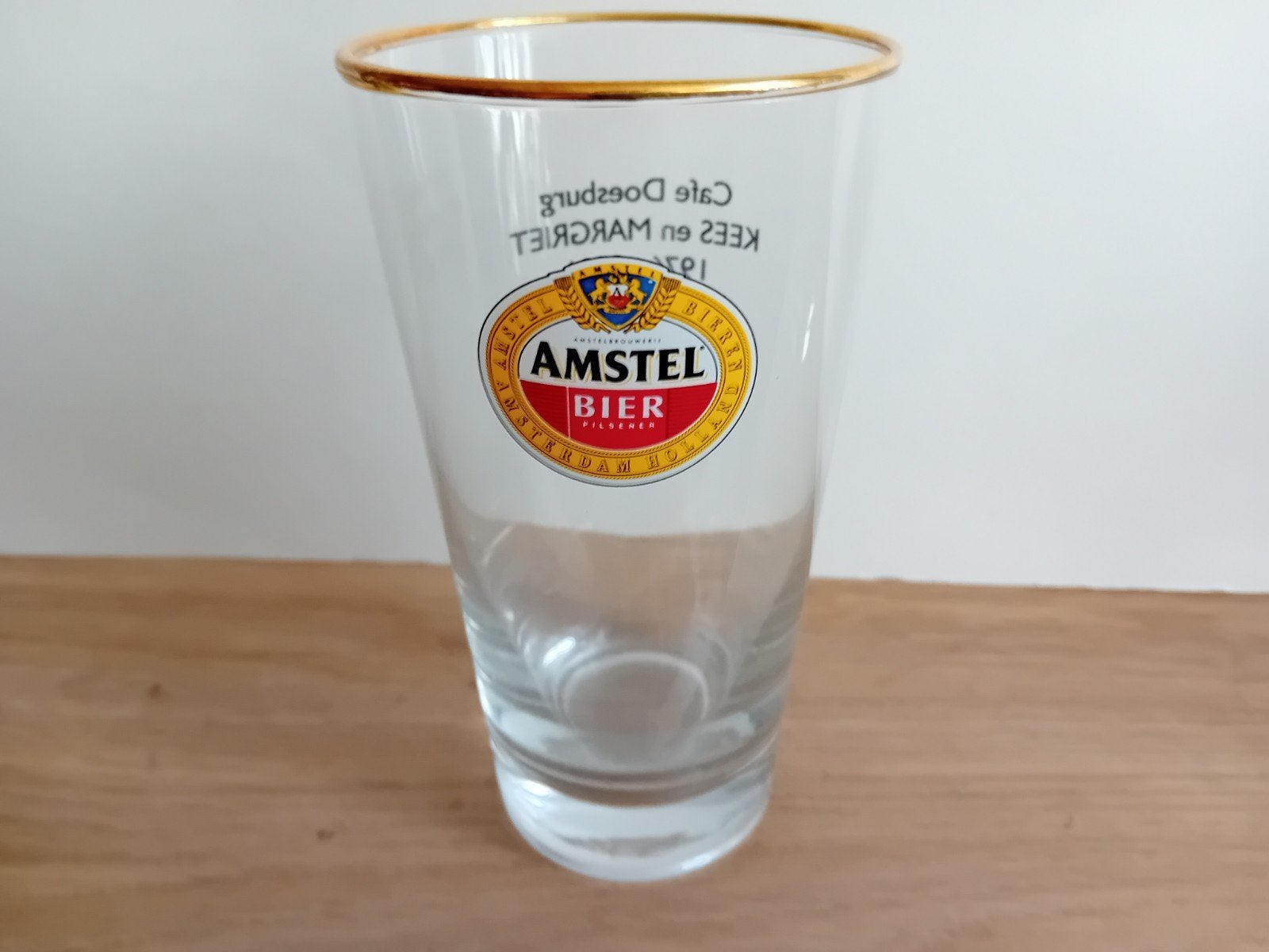 Amstel glas nummer 2 met achteropdruk, Verzamelen, Ophalen of Verzenden, Zo goed als nieuw, Glas of Glazen, Amstel