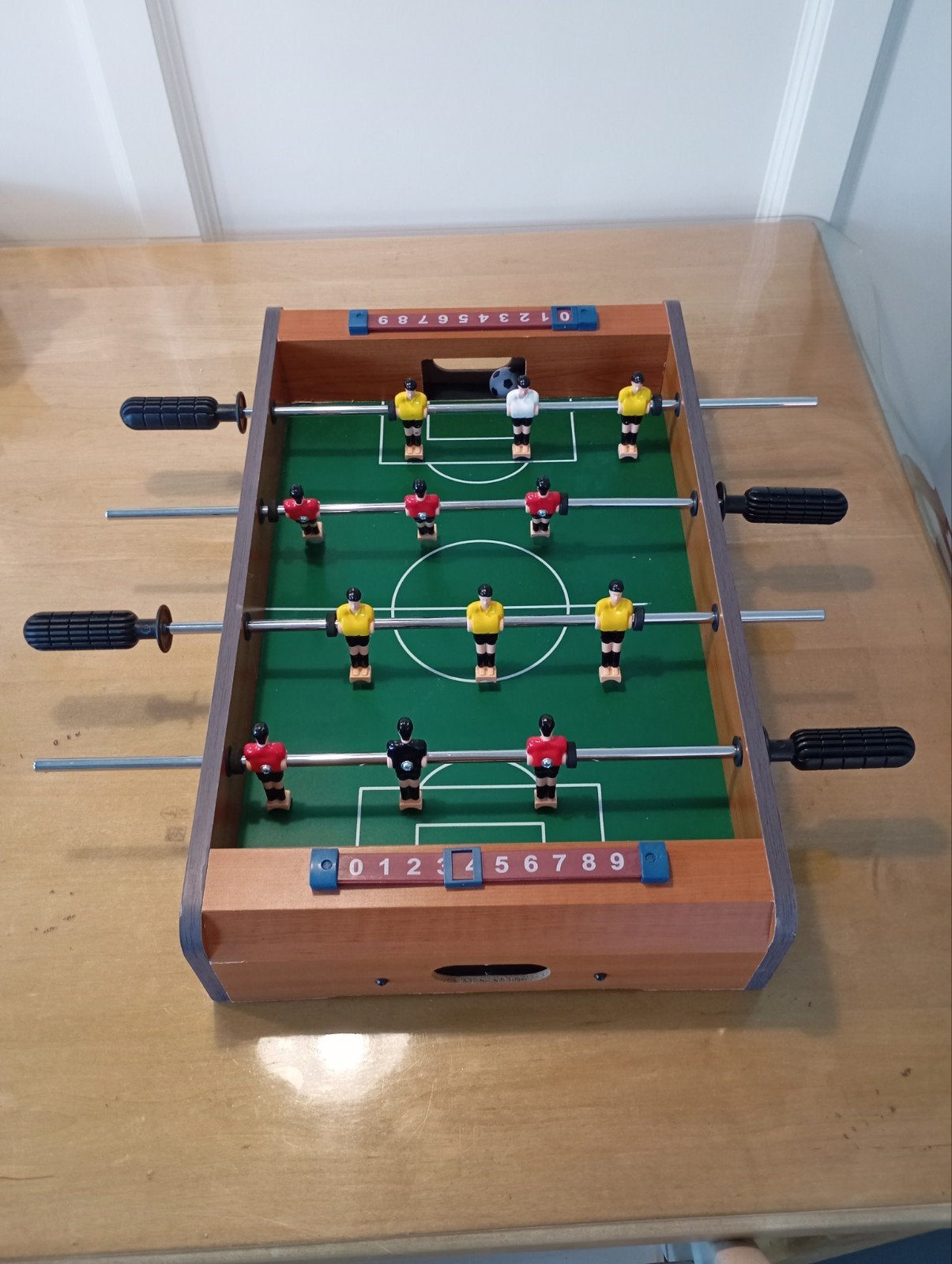 Tafelvoetbal klein, Ophalen