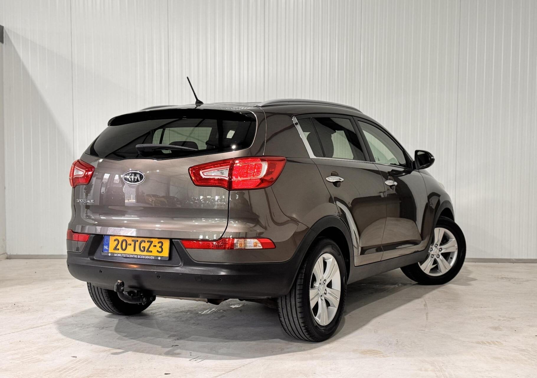Kia Sportage 1.6 GDI Plus Pack|TREKHAAK|CAMERA|NAVI|CRUISE, Auto's, Voorwielaandrijving, Euro 5, 135 pk, 1591 cc