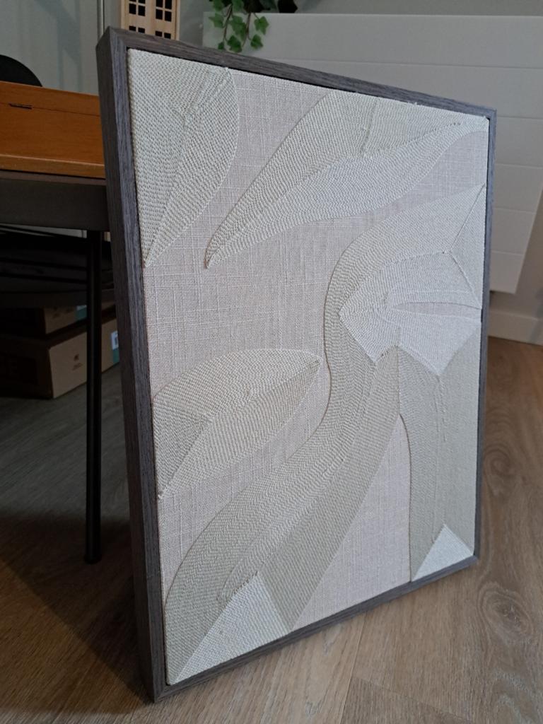 Linnen kunstwerkje met decoratief patroon in lijst, Ophalen