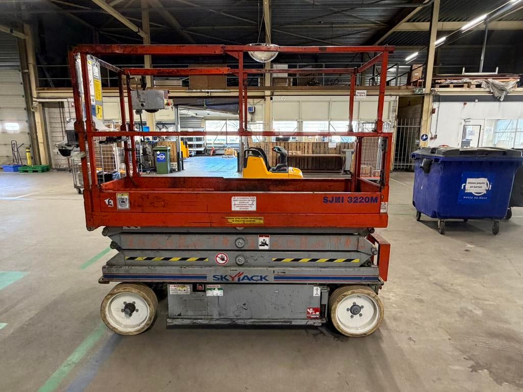 Schaarhoogwerker Skyjack SJ3220M, Zakelijke goederen, Machines en Bouw | Liften, Steigers en Ladders, Ophalen