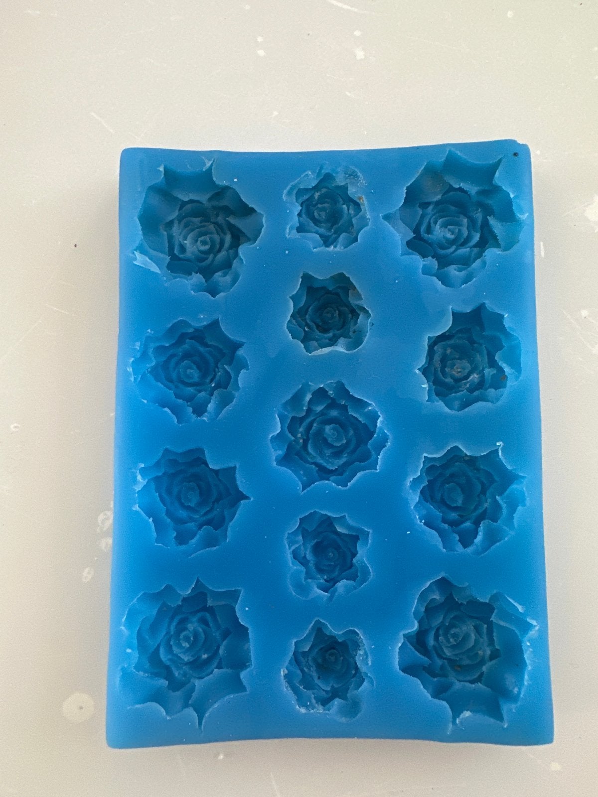 Siliconen mal met 12 roosjes - Knutselmateriaal, Gebruikt, Blauw, Rubber, Herbruikbaar