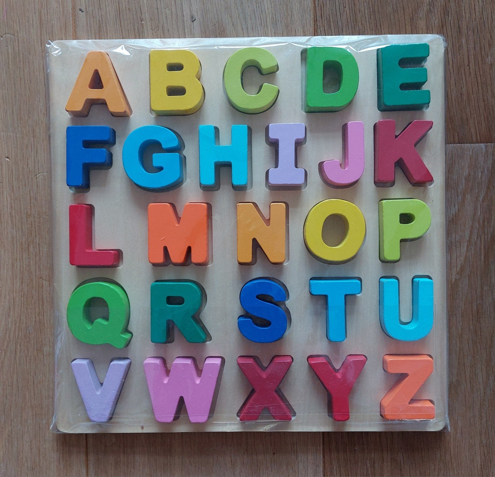 Houten letterpuzzel New Classic Toys, Kinderen en Baby's, Speelgoed | Houten speelgoed, Ophalen of Verzenden, Zo goed als nieuw