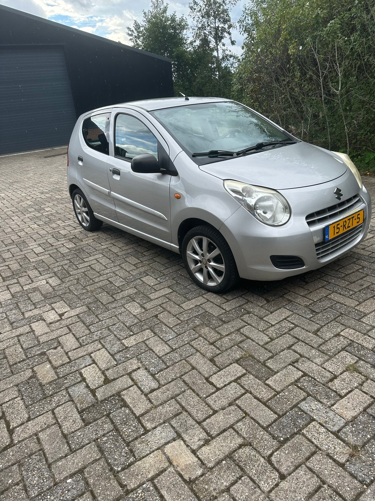 Suzuki Alto 1.0 2011 Grijs met airco, Auto's, Voorwielaandrijving, 200 kg, 4 stoelen, Origineel Nederlands
