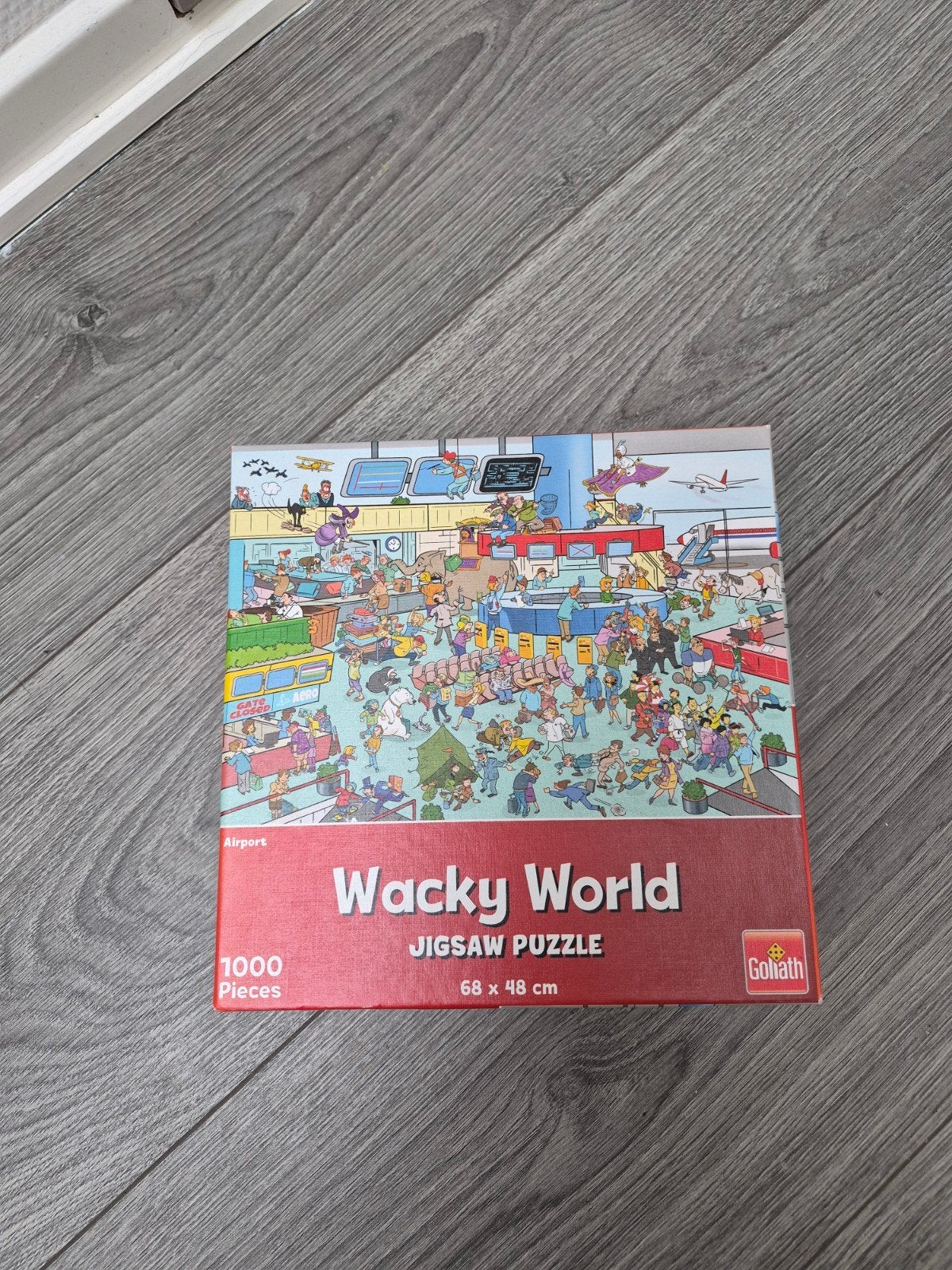 Goliath Wacky World Jigsaw Puzzle - Luchthaven 1000 stukjes, Ophalen of Verzenden, 500 t/m 1500 stukjes, Gebruikt, Legpuzzel