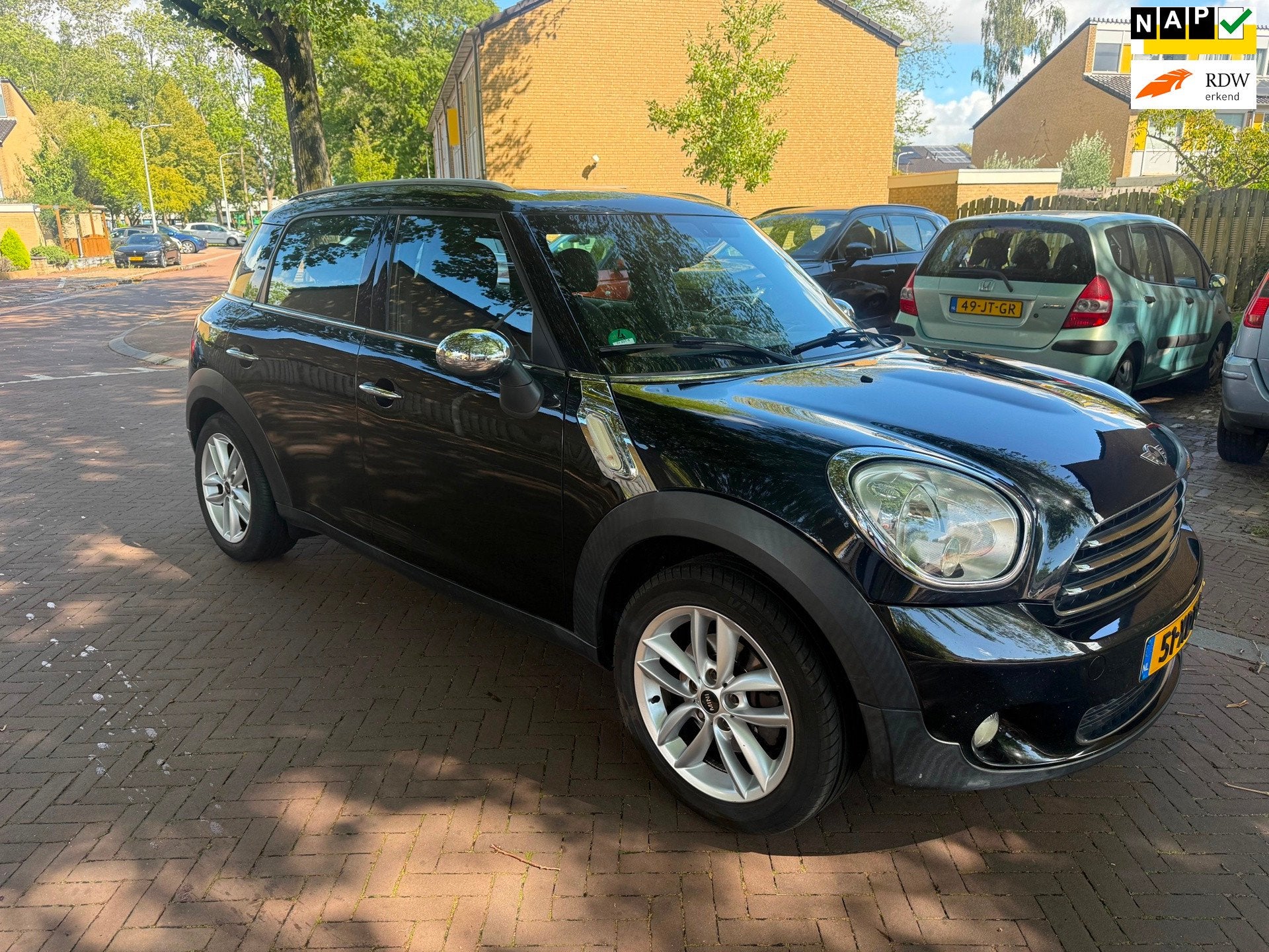 Mini Countryman Airco / 5 deurs / Bouwjaar 2012 / Nette auto, Auto's, Voorwielaandrijving, Euro 5, Gebruikt, Leder en Stof