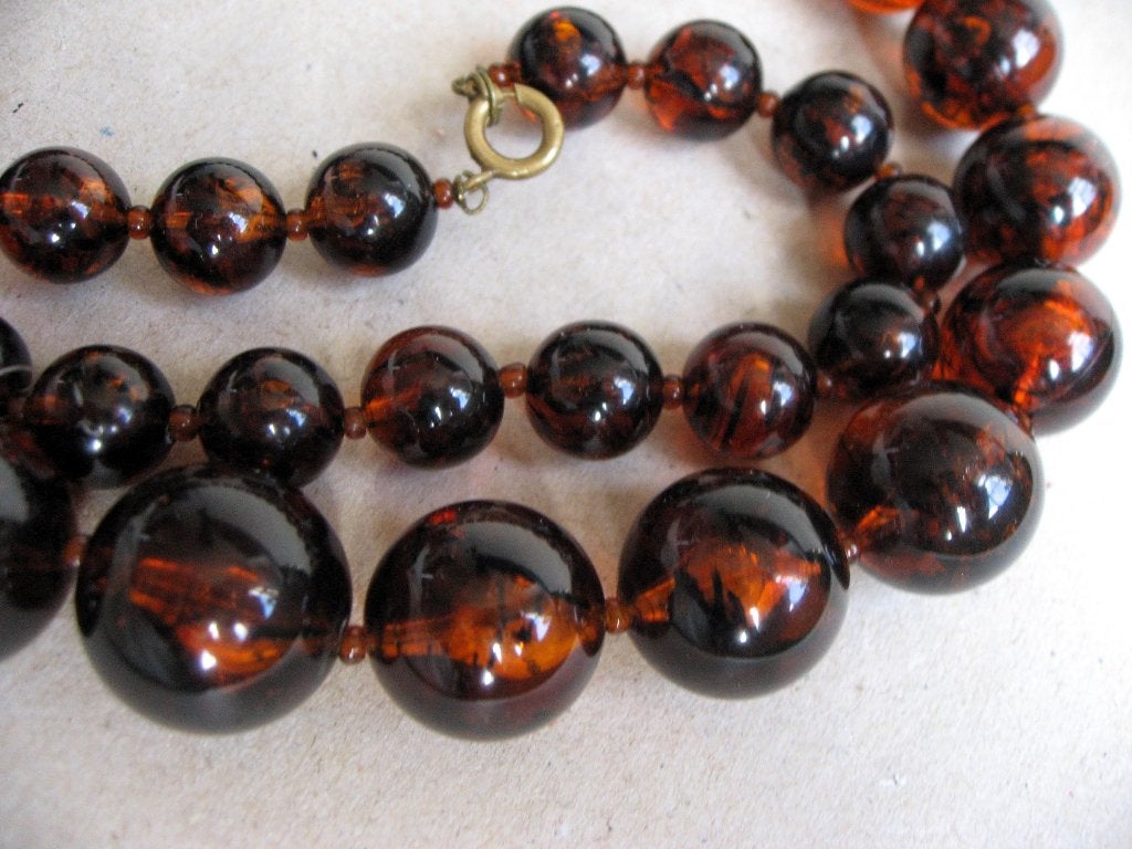 Antieke amberkleurige ketting; faux amber jaren 30-50, Ophalen of Verzenden, Overige materialen, Ketting