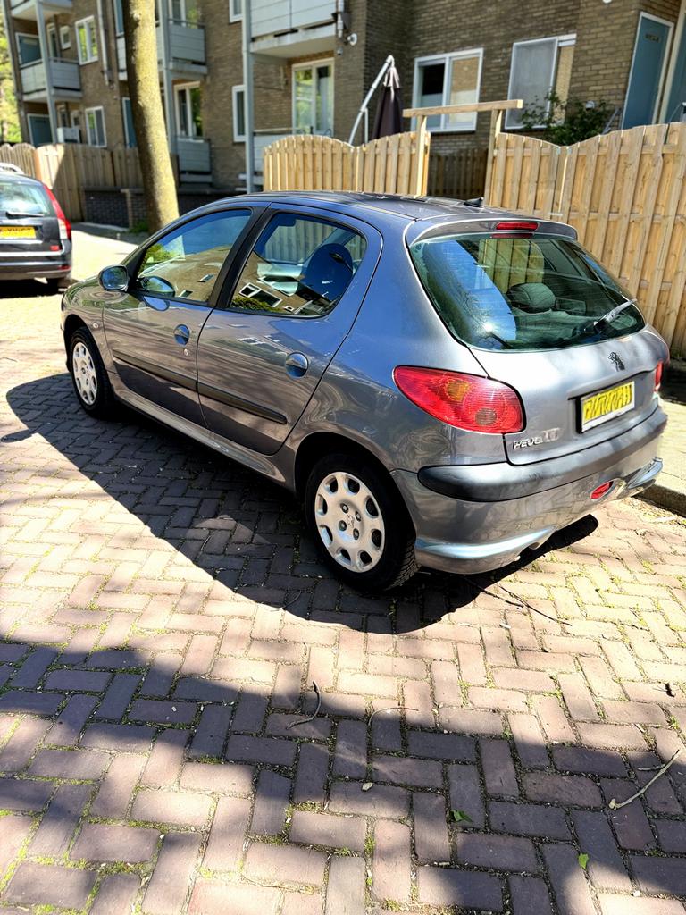 Peugeot 206 1.4 5D 2009 Grijs, Auto's, Peugeot, Particulier, Benzine, D, Hatchback, Handgeschakeld, Geïmporteerd, Zilver of Grijs