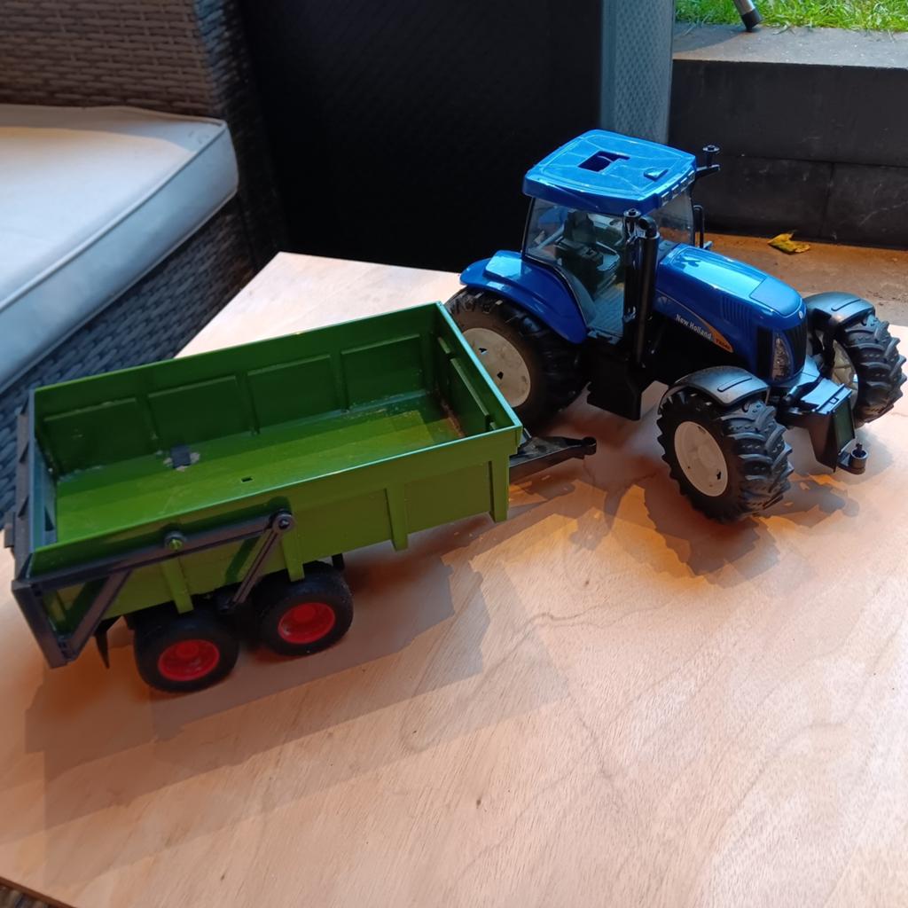 Bruder New Holland tractor met kiepwagen, Kinderen en Baby's, Speelgoed | Speelgoedvoertuigen, Ophalen of Verzenden, Gebruikt