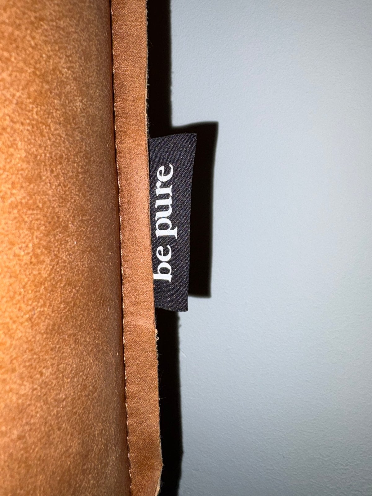 Be Pure poef/voetenbank in cognac leer, Ophalen, 100 tot 125 cm, Leer, Zo goed als nieuw