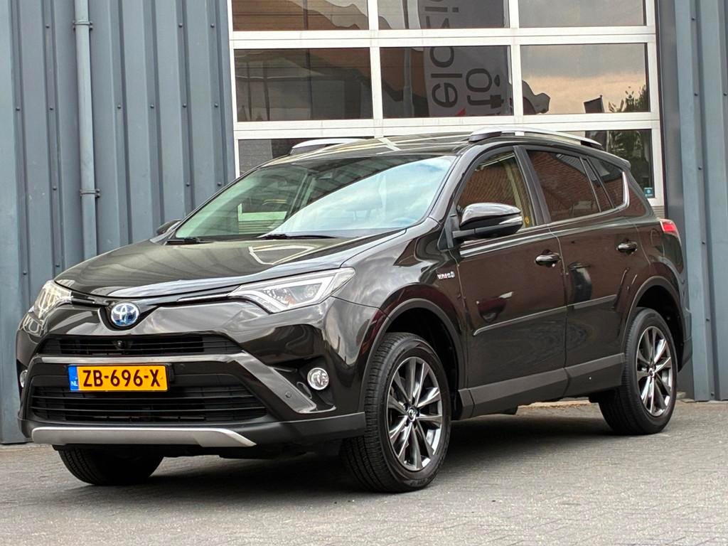Toyota RAV4 2.5 Hybrid Executive Business Leder Camera Trekh, Auto's, Gebruikt, Euro 6, Bruin, Leder