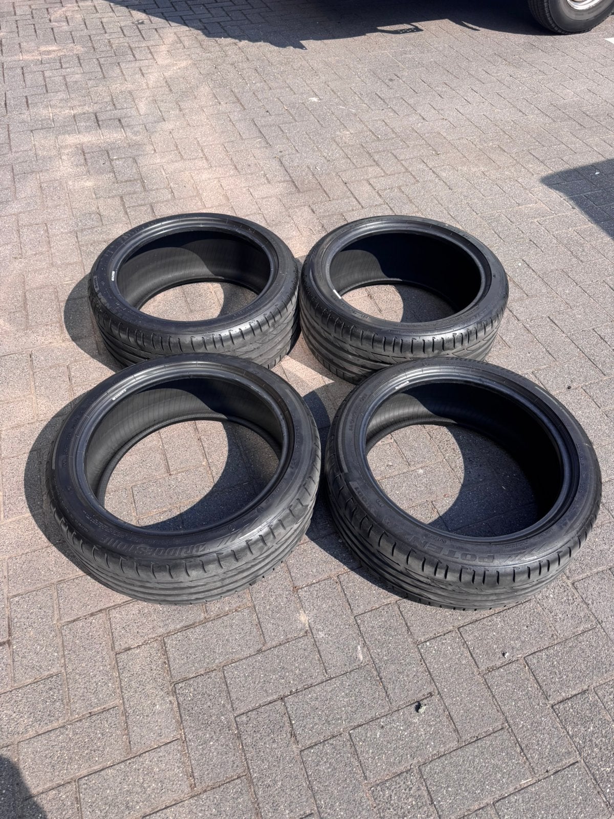 4 x Bridgestone banden 245/40R18 en 224/45R18, Ophalen, Zo goed als nieuw