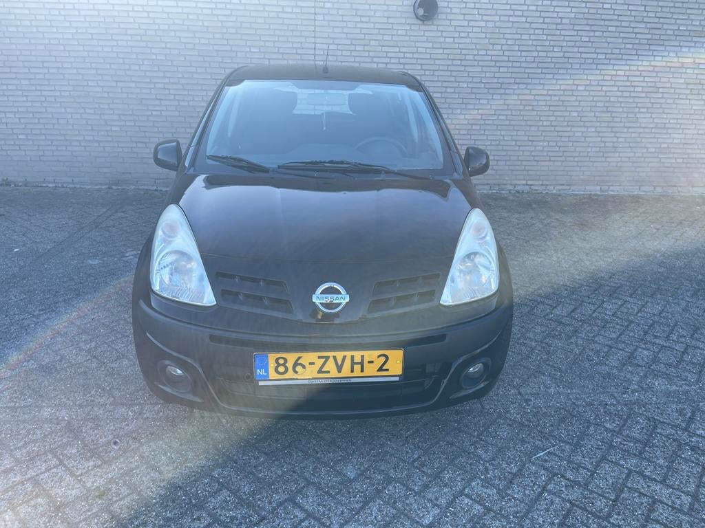 Nissan Pixo 1.0 50KW 5D 2010 Zwart, Auto's, Nissan, Voorwielaandrijving, 200 kg, 4 stoelen, Bedrijf