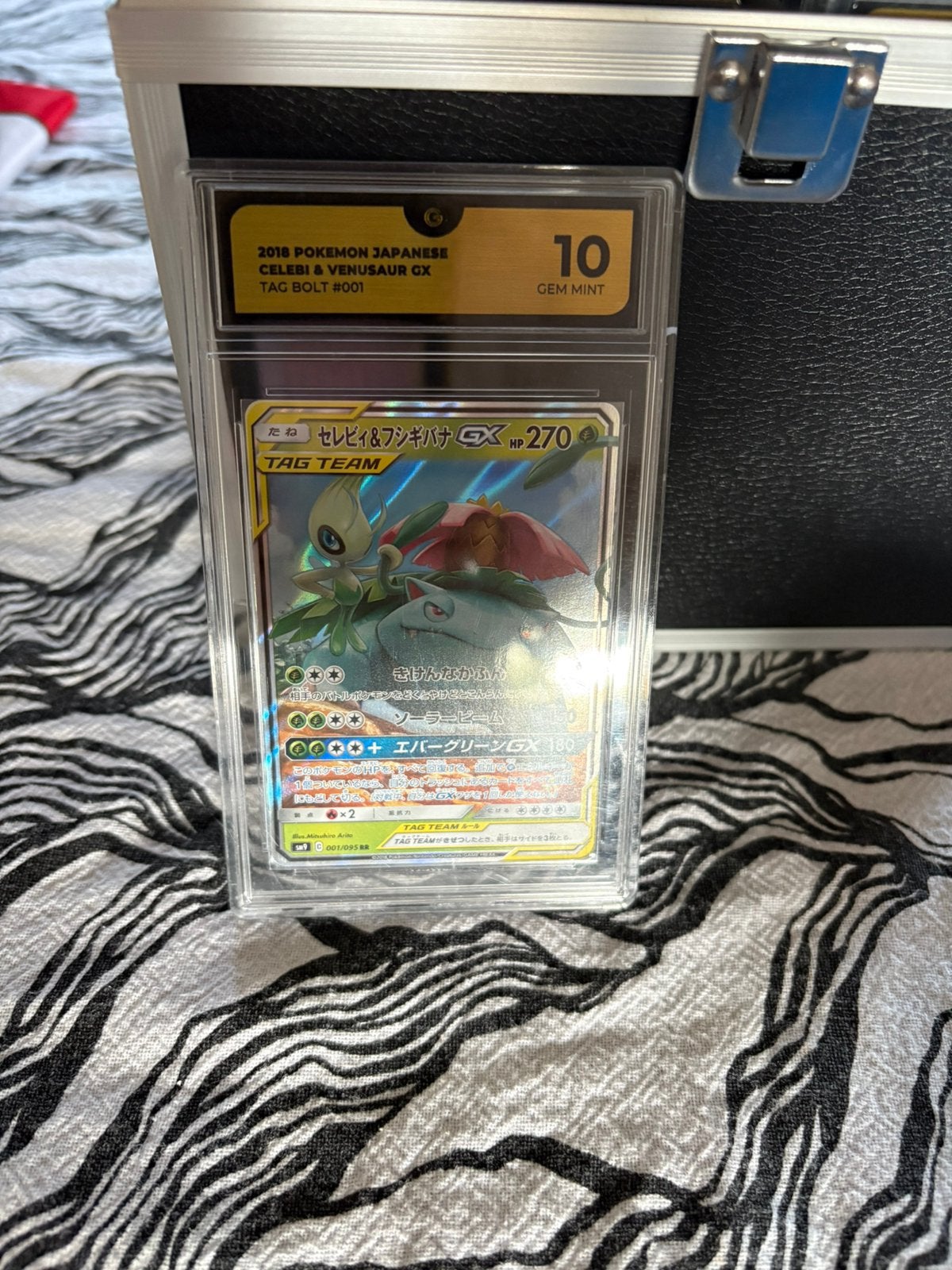 Venusaur en celebi gx grade 10, Hobby en Vrije tijd, Verzamelkaartspellen | Pokémon, Ophalen of Verzenden, Zo goed als nieuw, Meerdere kaarten