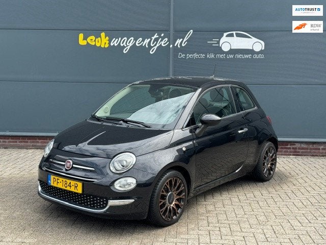 Fiat 500 0.9 TwinAir Turbo Lounge *navi *climate *16" *NL, Voorwielaandrijving, Gebruikt, Leder en Stof, Origineel Nederlands