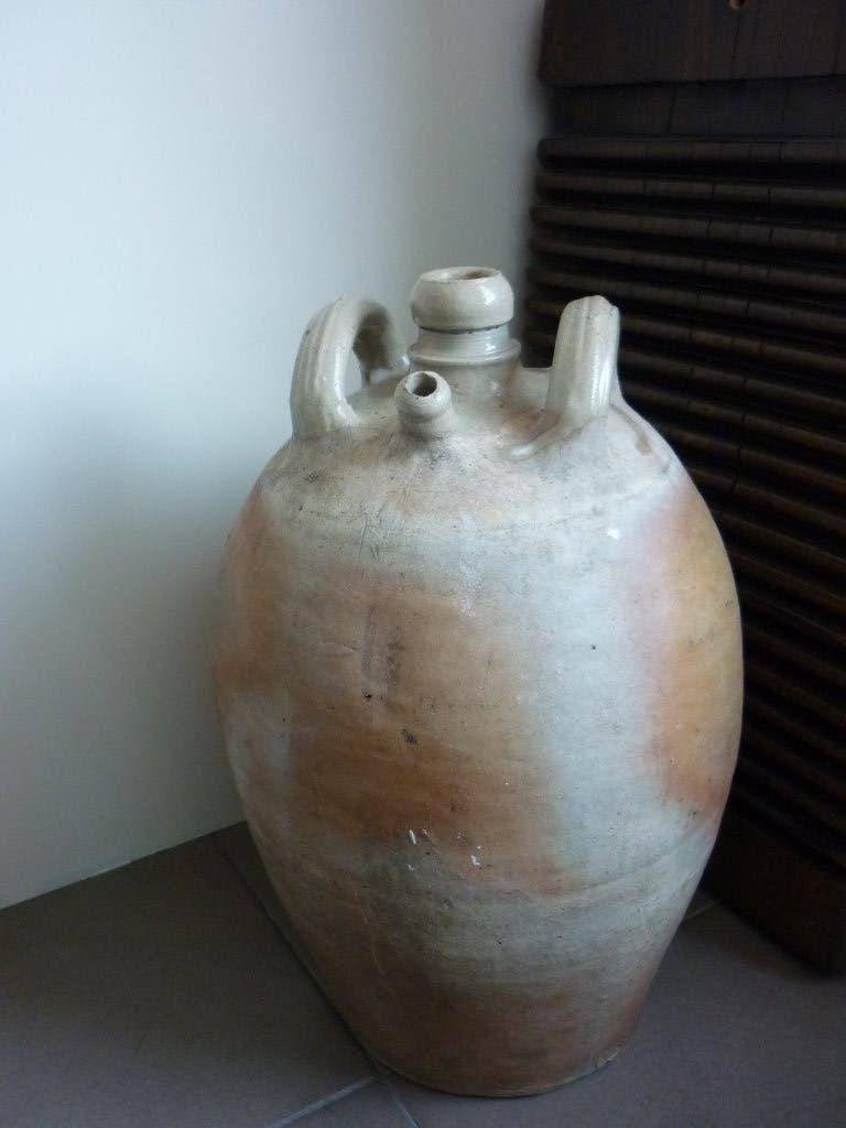Antieke Franse waterkruik van licht geglazuurd aardewerk., Verzenden