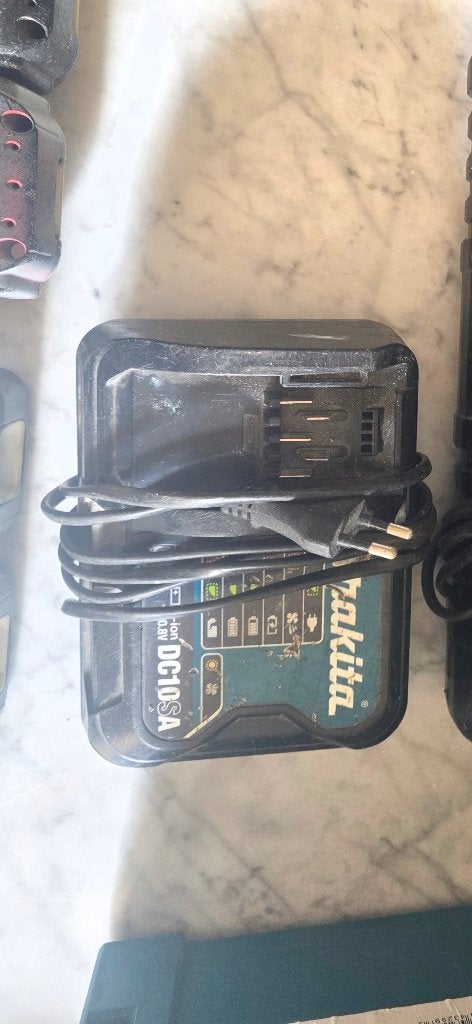 Makita DC10SA snellader 10.8V - 12V max CXT, Ophalen of Verzenden, Gebruikt, Makita