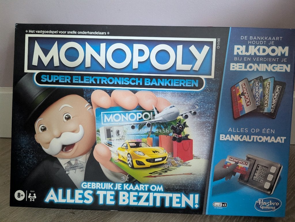 Monopolie Elektronisch | bankpasje, Hobby en Vrije tijd, Een of twee spelers, Ophalen of Verzenden, Zo goed als nieuw, Monopoly